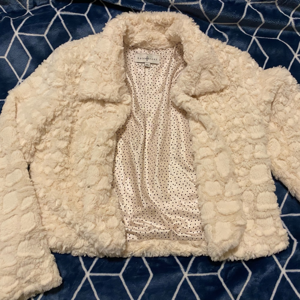 KateRosy faux fur white jacket. Fits size small to medium.